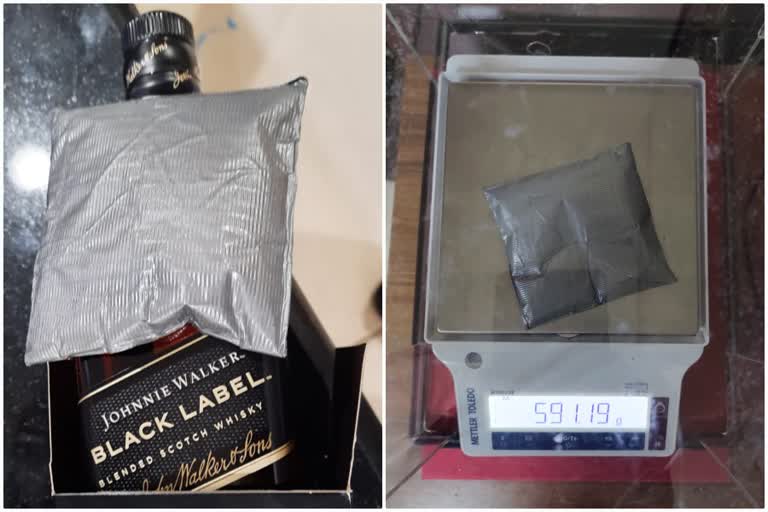 Gold smuggling  Gold smuggling through liquor bottle  kochi airport  മദ്യകുപ്പിയിൽ ഒളിപ്പിച്ച് കടത്താൻ ശ്രമം  എറണാകുളം  സ്വര്‍ണം പേസ്‌റ്റ് രൂപത്തിലാക്കി  സ്വർണം പിടികൂടി  മദ്യകുപ്പിയിൽ ഒളിപ്പിച്ച് കടത്താൻ ശ്രമിച്ച സ്വർണം  നെടുമ്പാശ്ശേരി  മദ്യക്കുപ്പിയില്‍  23 ലക്ഷം രൂപയുടെ സ്വർണം പിടികൂടി  കസ്‌റ്റംസ്  kerala latest news  kerala local news