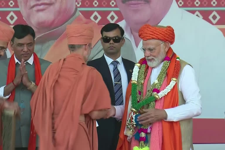 PM Modi meets BJP workers at Kamalam party office in Gujarat