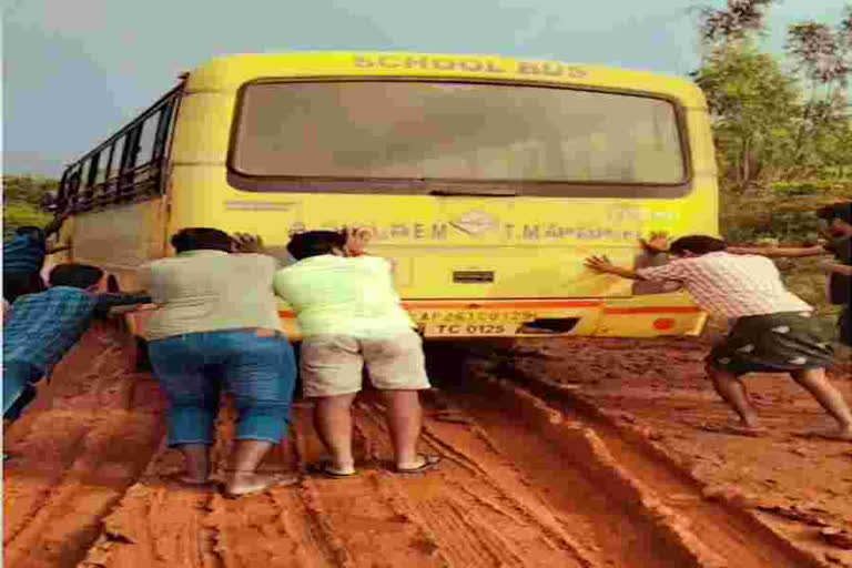 A school bus stuck in the mud