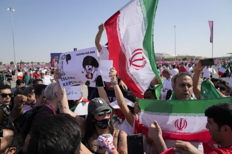 Iran regime supporters confront protesters at World Cup game