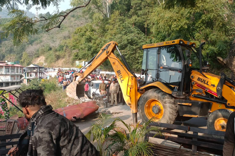 demolished encroachment on Mussoorie Dehradun road