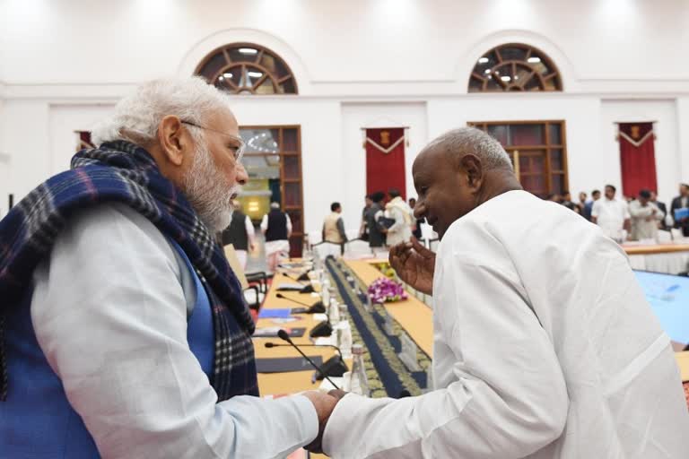 Modi and H D Devegowda