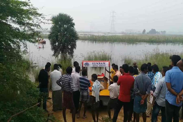 Father and son dead in pond