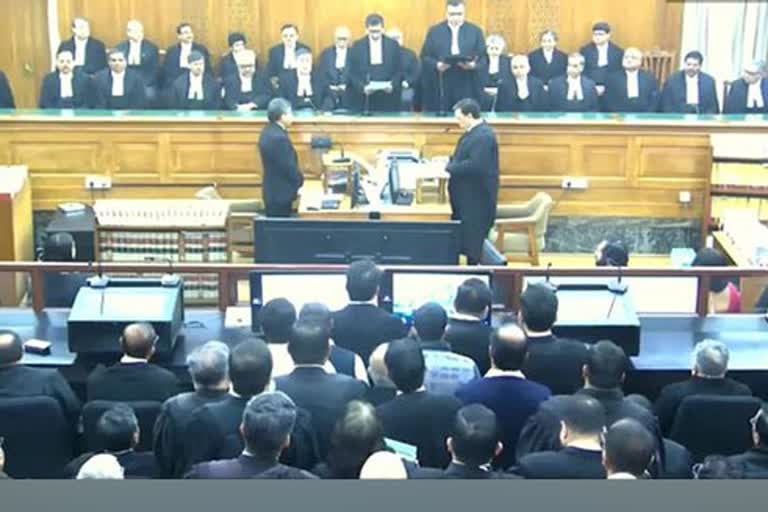 Chief Justice administers oath to Dipankar Dutta as a judge of the Supreme Court