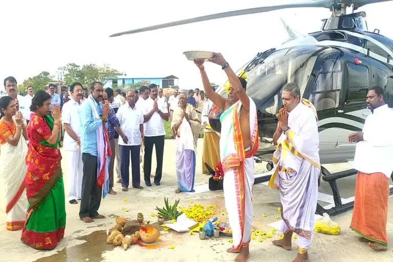 telangana-businessman-takes-helicopter-to-temple-for-vahan-puja