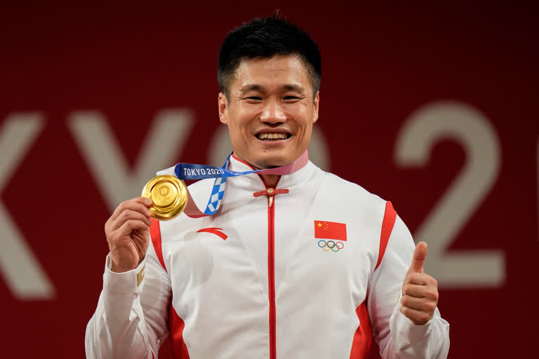 Olympic weightlifting champion Lyu Xiaojun