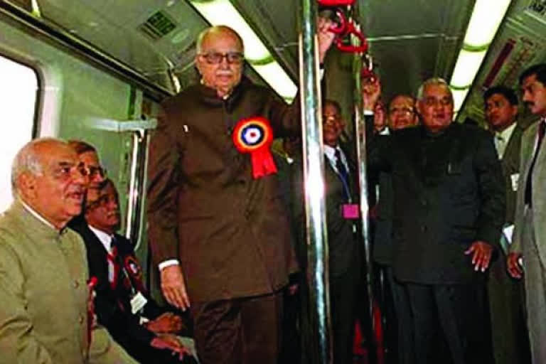 Former Prime Minister Atal Bihari Vajpayee and others travelling in a Delhi Metro train