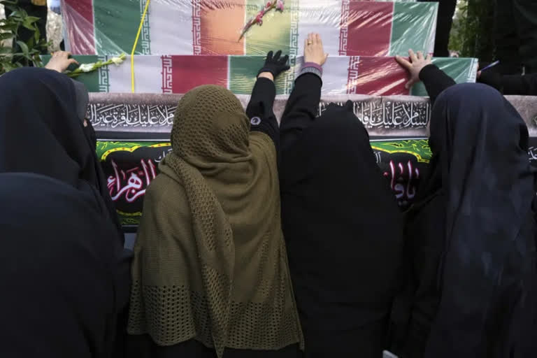 Iran holds funerals for troops killed in 1980s Iraq war