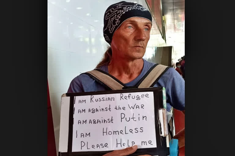 Russian carrying 'I am against Putin' placard detained in Odisha