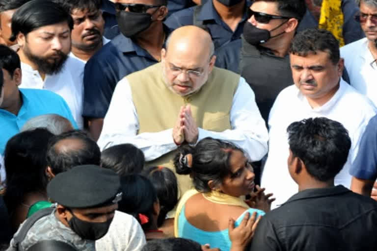 Amit Shah facing people in gathering