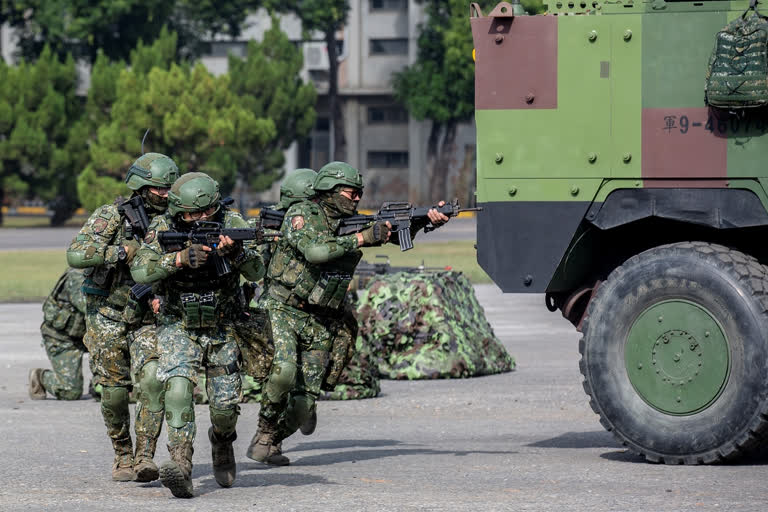 The Chinese military held large-scale joint combat strike drills starting Sunday, sending war planes and navy vessels toward Taiwan