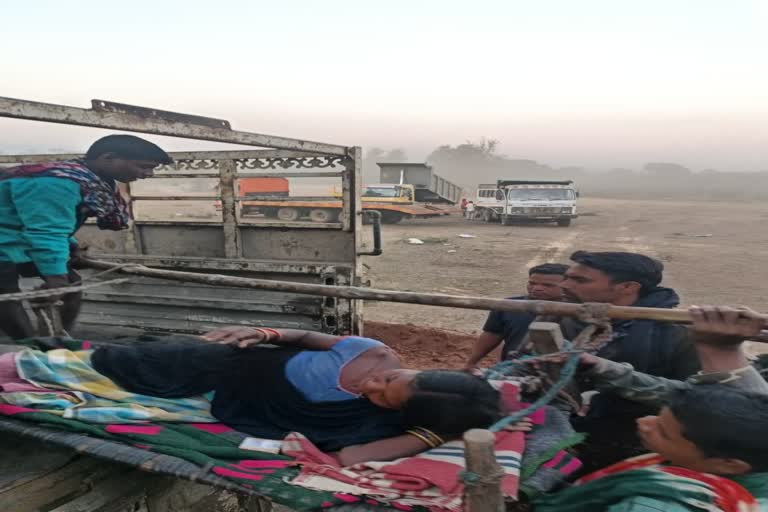 Villagers were taking the patient on the cot