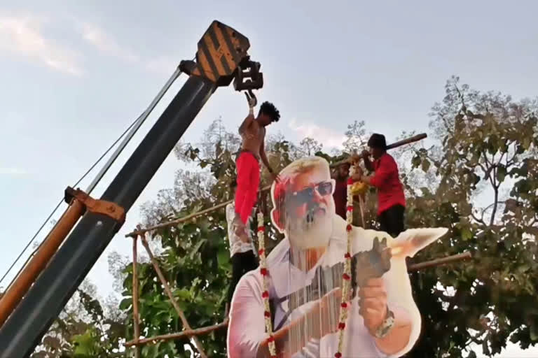 30 feet hero ajith cutout garlanded with help of crane and fan died during film release