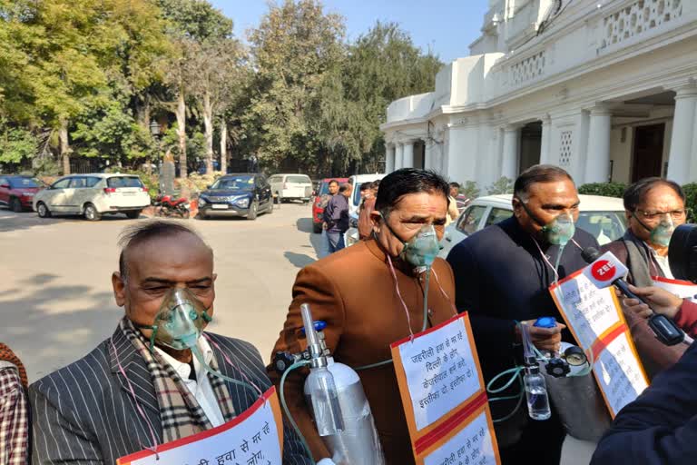 MLAs arrived in assembly wearing oxygen mask