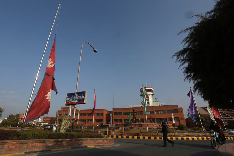 Nepal began a national day of mourning Monday as rescue workers resumed the search for six missing people a day after a plane to a tourist town crashed into a gorge while attempting to land at a newly opened airport