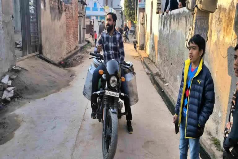 Amith Selling Milk in Harley Davidson