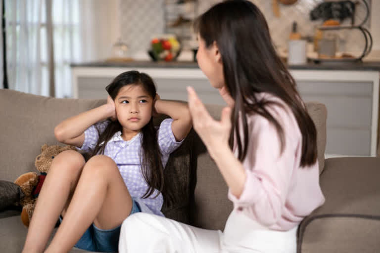 Angry Mother Shoughting daughter