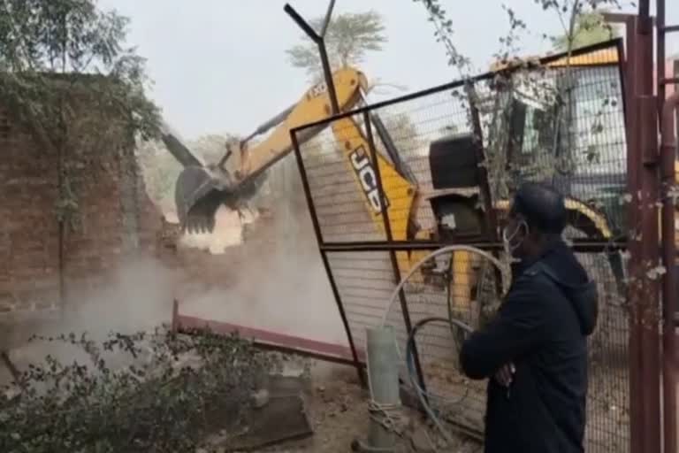 Bulldozer action on illegal plotting in Nuh