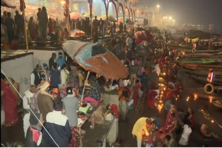 Amid the ongoing 'Magh Mela', devotees on Saturday took a holy dip in the river Ganga on the occasion of 'Mauni Amavasya' in Uttar Pradesh's Varanasi.