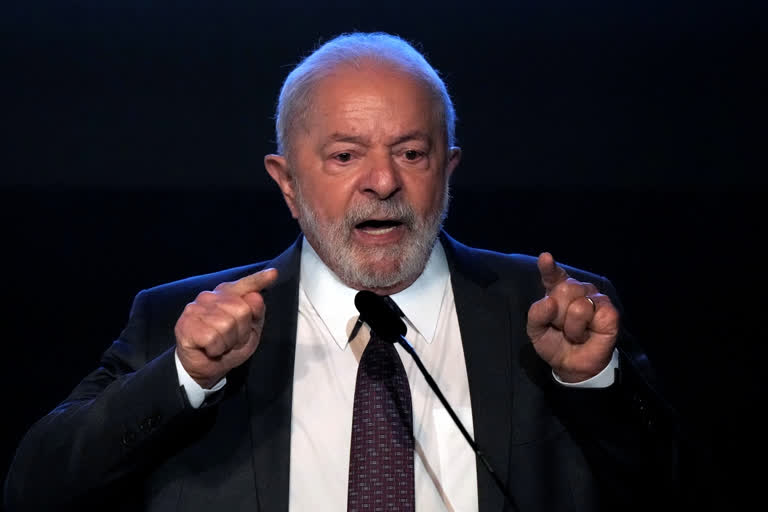 FILE - Brazil's President Luiz Inacio Lula da Silva speaks during the swearing-in ceremony of Tarciana Medeiros, the first woman to preside the Banco do Brasil, one of the country's main public banks, in Brasilia