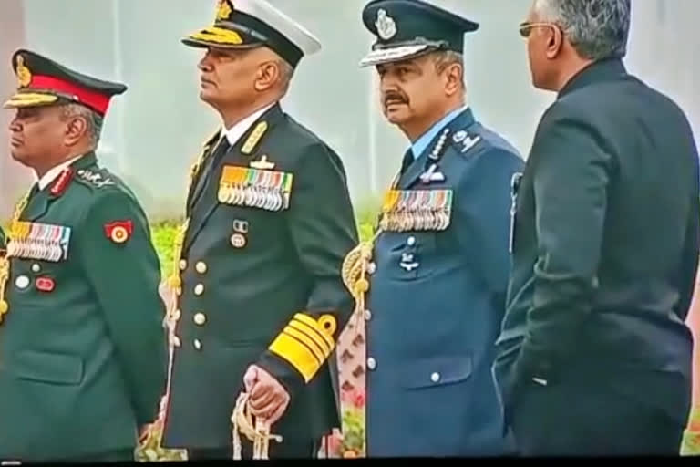 Defence Secretary Giridhar Aramane has attracted backlash over his 'conduct' while Union Defence Minister Rajnath Singh was paying his respects to the fallen at the War Memorial as part of 74th Republic Day celebrations.