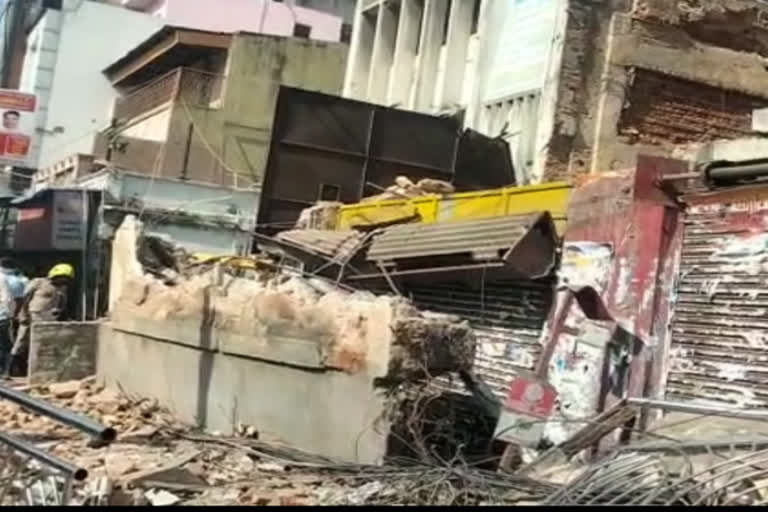 A woman who was walking on the road side was killed when a wall collapsed in Chennai