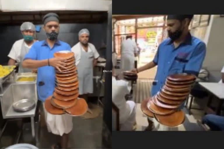 A waiter carrying 13 dosa plates at a time news