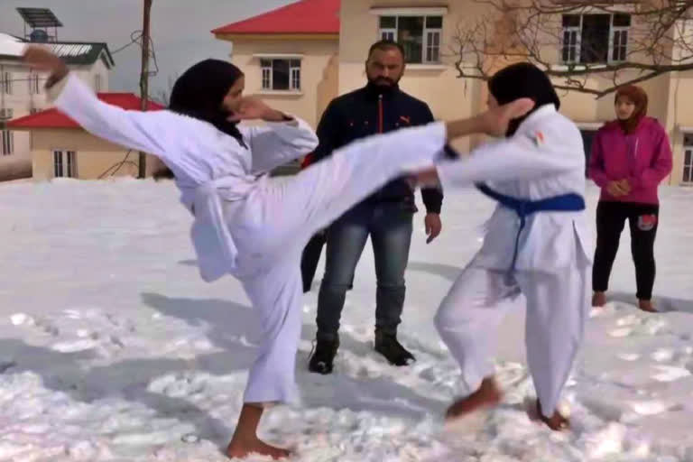 Girls of far flung areas of J-K's Budgam learn martial arts amid snowfall