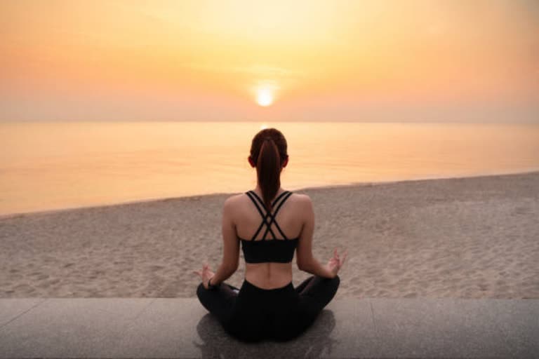 woman practicing yoga