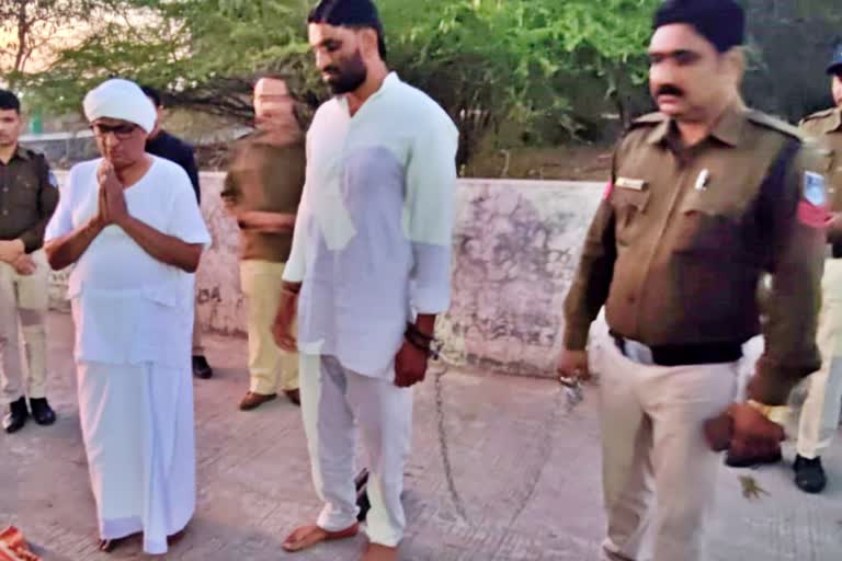 ujjain handcuffed father buries disabled son