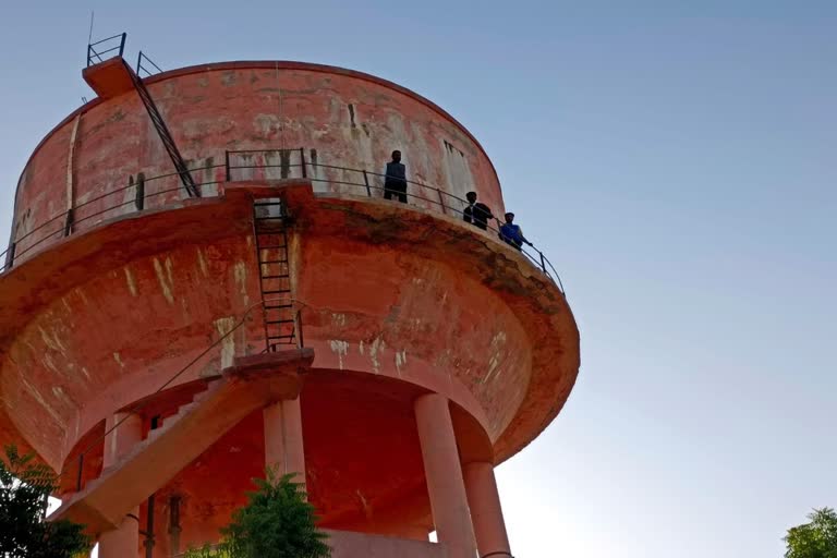 Family climbed atop water tank Dungar College