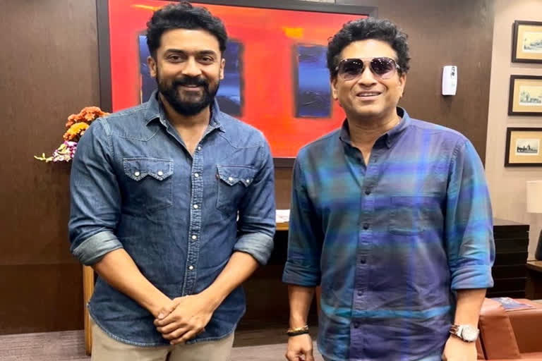 Suriya poses with Sachin Tendulkar