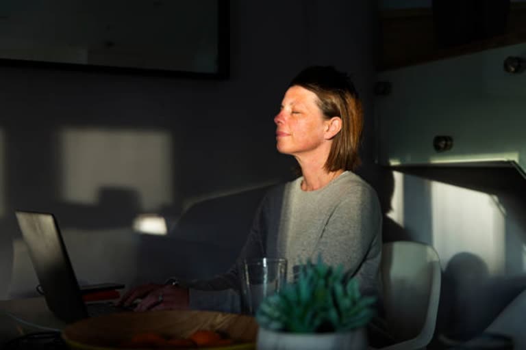 woman sitting in room