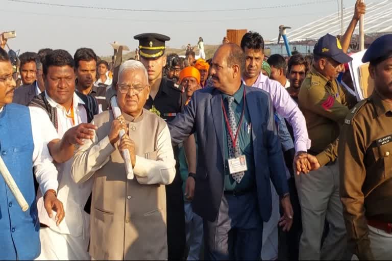 Governor Mangubhai Patel walked with pickaxe