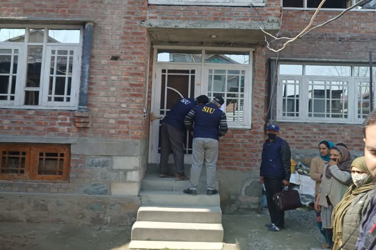 SIU attaches 4 houses in Srinagar