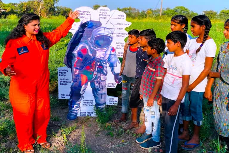 sarika gharu sing song on spacesuit