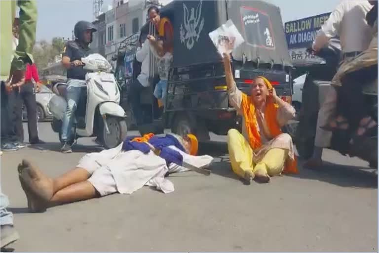 Elderly couple protest at Majitha Road police station in Amritsar for arrest of son killer