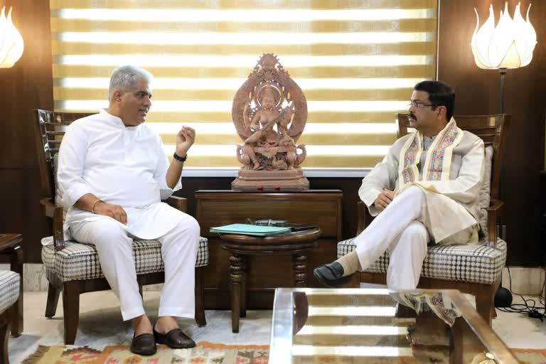 dharmendra pradhan meet minister bhupender yadav