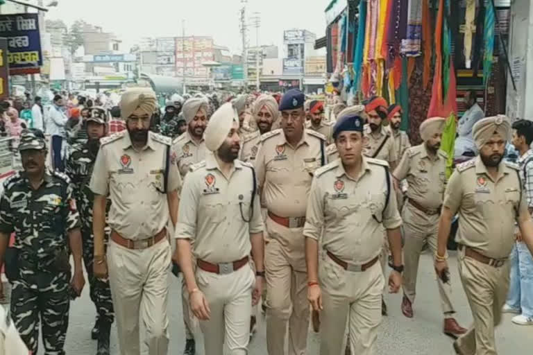 Flag march by police and central security forces in Mansa