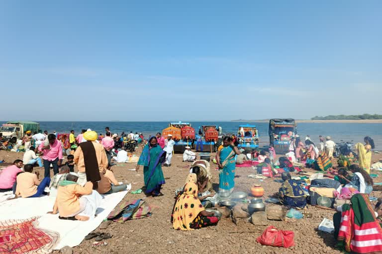 Devotees bath in Krishna River For Ugadi celebration