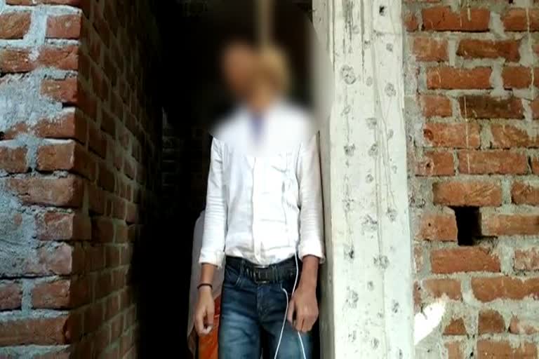 Youth commits suicide by hanging