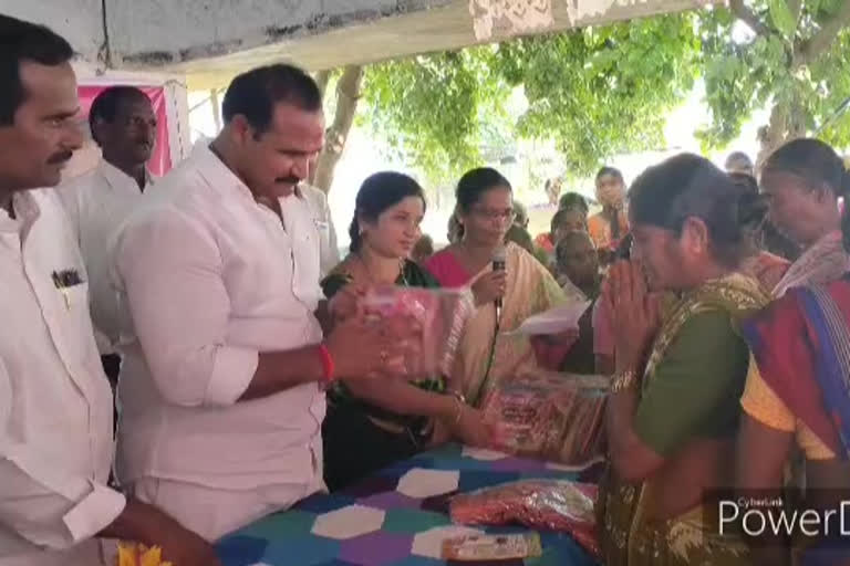 MLA distributing the Batukamma sarees in Nedigudem