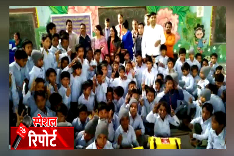 School bags distributed to children