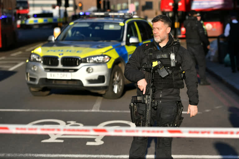 Police at the scene of an incident on London Bridge in central London following a police incident, on Friday.