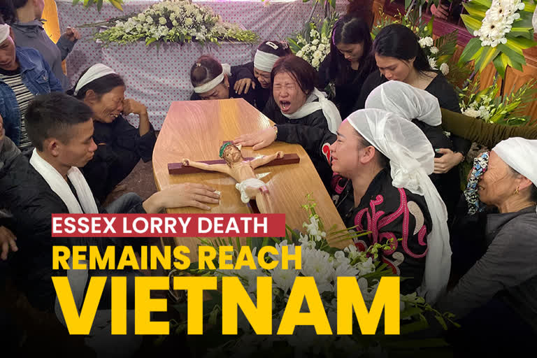 Relatives of Bui Thi Nhung weep as they gather around Nhung's casket at the family home on Saturday in the village of Do Thanh, Vietnam.