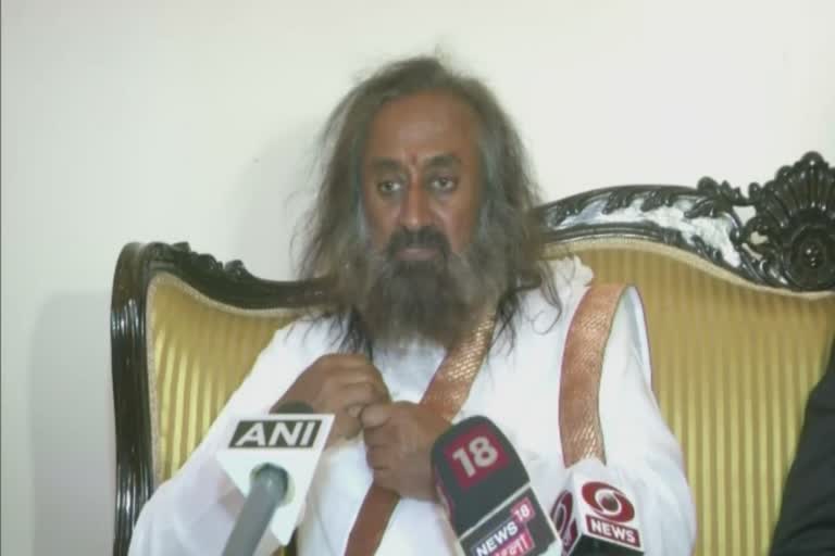 Double standard to seek review of Ayodhya verdict, time to   strengthen economy: Sri Sri Ravi Shankar