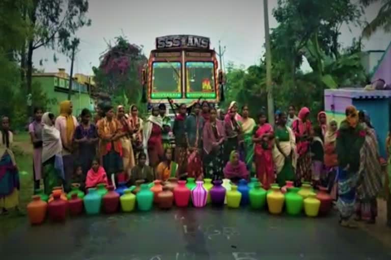 The women blocking for drinking wate