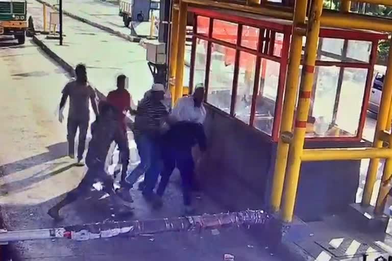 toll employee beaten by truck driver