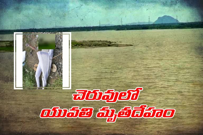 women body found in river at warangal district