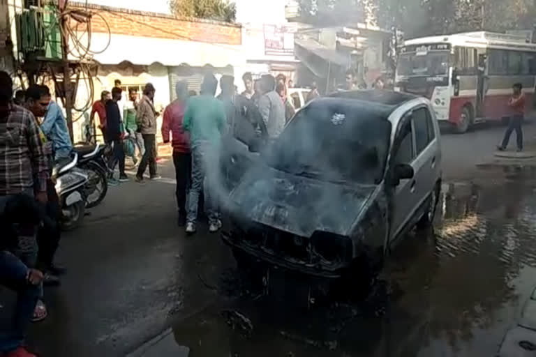 fire in moving car in Jhajjar